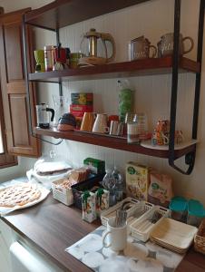 a kitchen counter with some food on it at Casa Laura in Modigliana