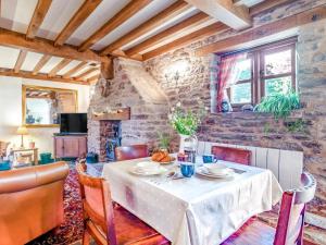 a dining room with a table and chairs at 1 Bed in Usk- oc-79936 in Llandenny