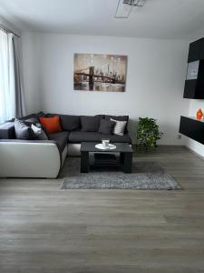 a living room with a couch and a coffee table at Na Písku in Most