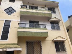 an apartment building with a balcony and windows at New Dawn luxury homes in Nairobi