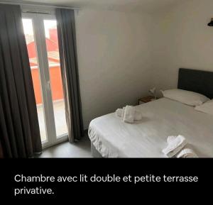 a bedroom with a bed and a sliding glass door at TRA MANNA in Lecci
