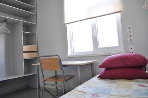 Voodi või voodid majutusasutuse Haapsalu Kutsehariduskeskuse hostel toas