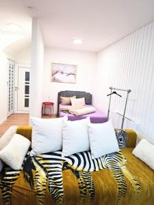 Giường trong phòng chung tại Casa Amore