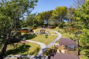 an aerial view of a park with a gazebo at Pods @ Broadway in Laugharne