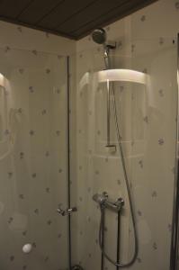 a shower in a bathroom with stars on the wall at 14 - Fulufjellets national parks-This is the place where Norway and Sweden meet in a large protected area for animals and nature in Trysil +144 photos