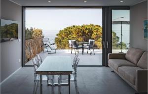 a living room with a couch and a table at Seaside Escape in Trieste
