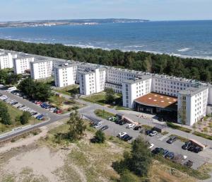 an aerial view of a city with a parking lot at Mariandl am Meer in Binz