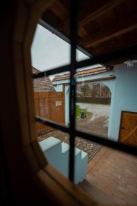 a view from a window of a patio at Azuria Viscri in Viscri