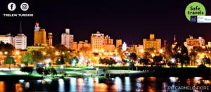 a view of a city at night with a city at Hotel City in Trelew