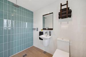 a bathroom with a sink and a toilet and a mirror at 1 Bed in Minsterley oc-s38642 in Minsterley +12 photos