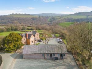 an overhead view of a house with a parking lot at 1 Bed in Minsterley oc-s38641 in Minsterley