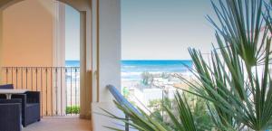 a room with a view of the beach and the ocean at Hotel Merano in Misano Adriatico