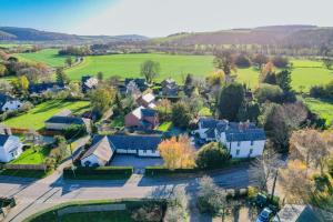 an aerial view of a suburb with houses at Willow Cottage in North Lydbury