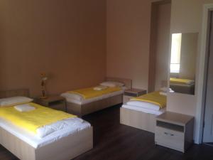 Postel nebo postele na pokoji v ubytování Valdemara Residence