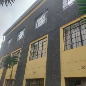 a building with many windows on the side of it at Serenity villa homes in Nairobi