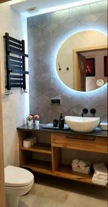 a bathroom with a sink and a mirror at Pokoje Gościnne U Anny in Nowy Targ +118 photos