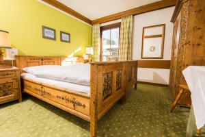 Voodi või voodid majutusasutuse Hotel zur Post toas
