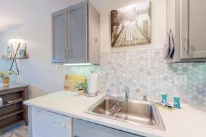 a kitchen with a sink and a counter top at Tranquil condo in Stateline sleeps 4 in Stateline
