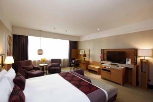 Postel nebo postele na pokoji v ubytování Fullon Hotel Taipei, Central