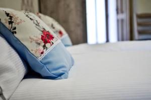 Postel nebo postele na pokoji v ubytování Páva Apartmanház
