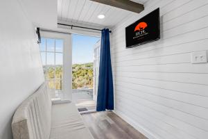 a room with a couch and a window at The Container Retreat - C10 in Canyon Lake