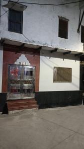 a building with a gate on the side of it at Sakchi Gopal Ashram in Vrindāvan