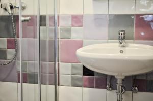 Koupelna v ubytování Páva Apartmanház