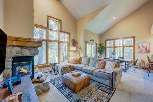 a living room with a couch and a fireplace at Idyllic Incline Village Getaway in Incline Village