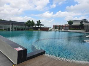 a large swimming pool on top of a building at Aliffheight in Johor Bahru