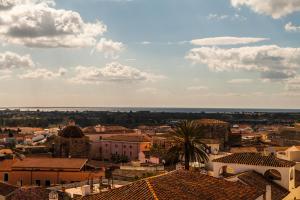 a view of a city with buildings and trees at Smart Convenient Apartments Orosei in Orosei