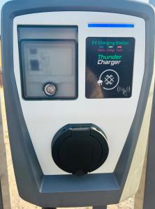 a parking meter with a sign on the side of it at Rami Jūra 2022 in Šventoji