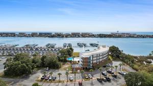 an aerial view of a building with a large body of water at Pirates Bay B215 in Fort Walton Beach