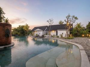 an image of a swimming pool in a villa at Sardja Uluwatu in Uluwatu