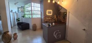 a shop with vases and a counter in a room at Casa Agena in Cartagena de Indias