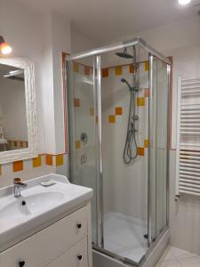 a bathroom with a shower and a sink at ValeHouse in Fiumicino +22 photos