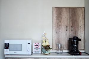 Kuchyň nebo kuchyňský kout v ubytování Páva Apartmanház