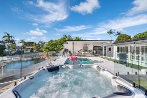 an indoor swimming pool in a house at Coastal Waterfront Broadbeach Waters in Gold Coast