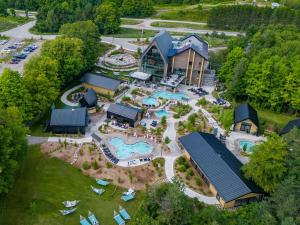 an aerial view of a resort with a pool at Lux Studio in Horseshoe Valley in Shanty Bay