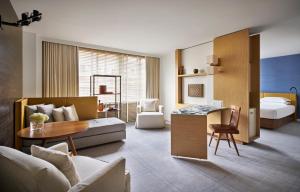 a living room with a couch and a table at Park Hyatt Washington in Washington, D.C. +45 photos