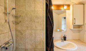 a bathroom with a shower and a sink at VE264-Vejers-Strand-Jafdalvej-95 in Vejers Strand +22 photos