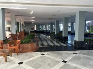 a lobby with a checkered floor in a building at MC La Quinta in Santa Úrsula +9 photos