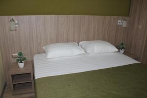 Cama o camas de una habitación en Hotel Vega