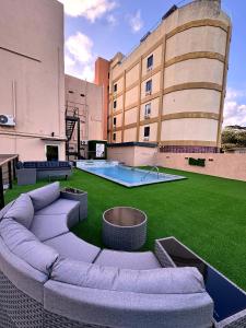 a large couch sitting on the roof of a building at The Hive Boutique Hotel Double Room 109 in Scarborough