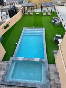 an overhead view of a swimming pool on a building at The Hive Boutique Hotel Double Room 109 in Scarborough