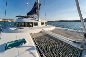 a boat with a ramp on the water at Nuit en Catamaran aux Iles de Lérins in Cannes