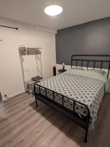 a bedroom with a bed and a shelf in it at Saint Georges - ParisSmile in Villeneuve-Saint-Georges +16 photos
