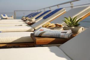 a row of pillows on a cruise ship at Hotel Cristallo in Giulianova