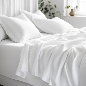 a white bed with white sheets and pillows at Deluxe Room! in Lucan