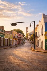 an empty street in an old town at Hostalgia Casa Zul in Puebla