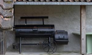 an old fashioned stove is attached to a wall at La casa del lupo in Colico